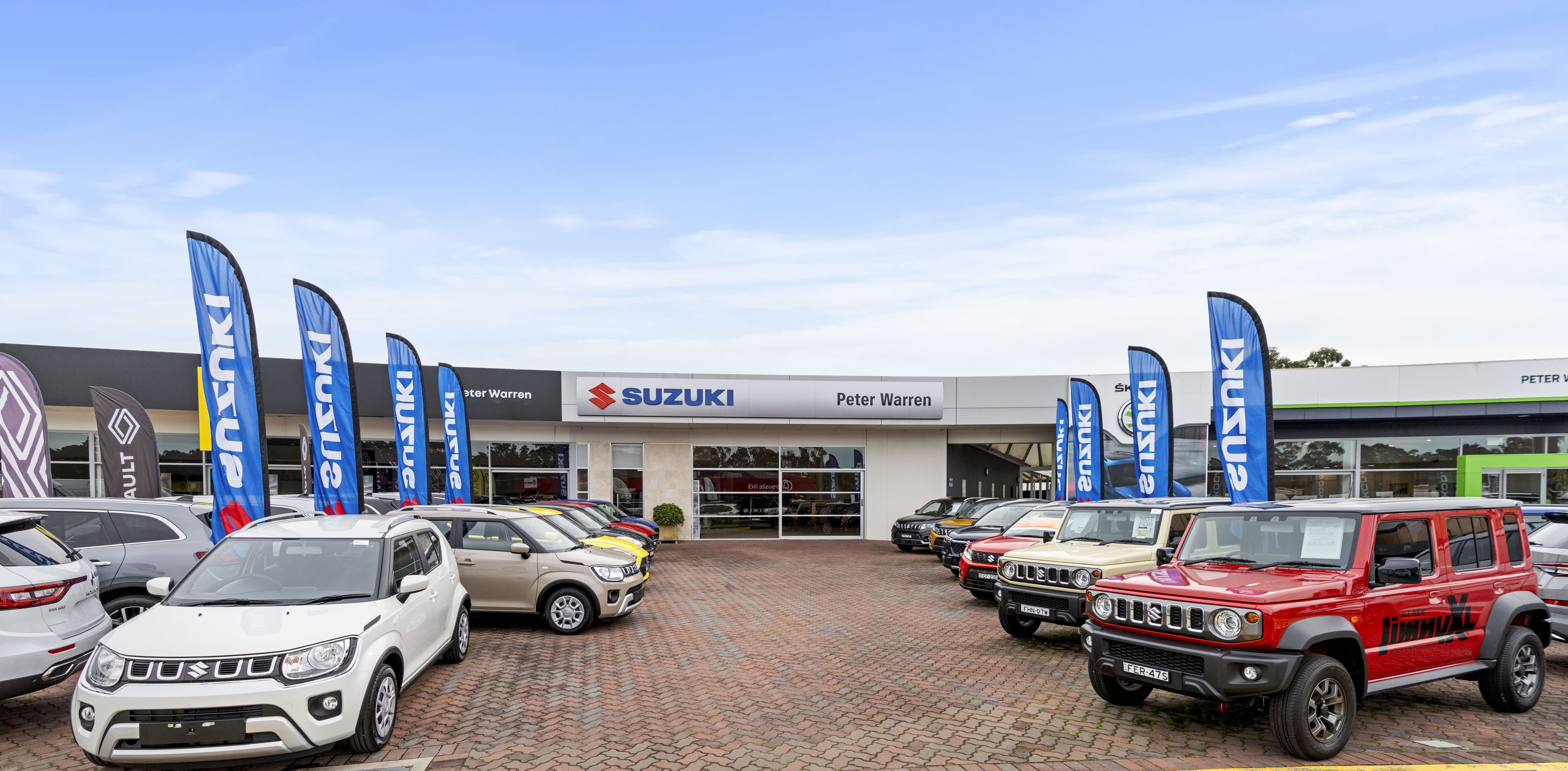 Peter Warren Suzuki logo