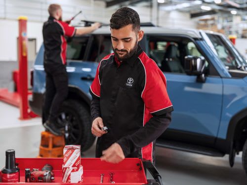 Toyota Service technician working on a Toyota RAV4