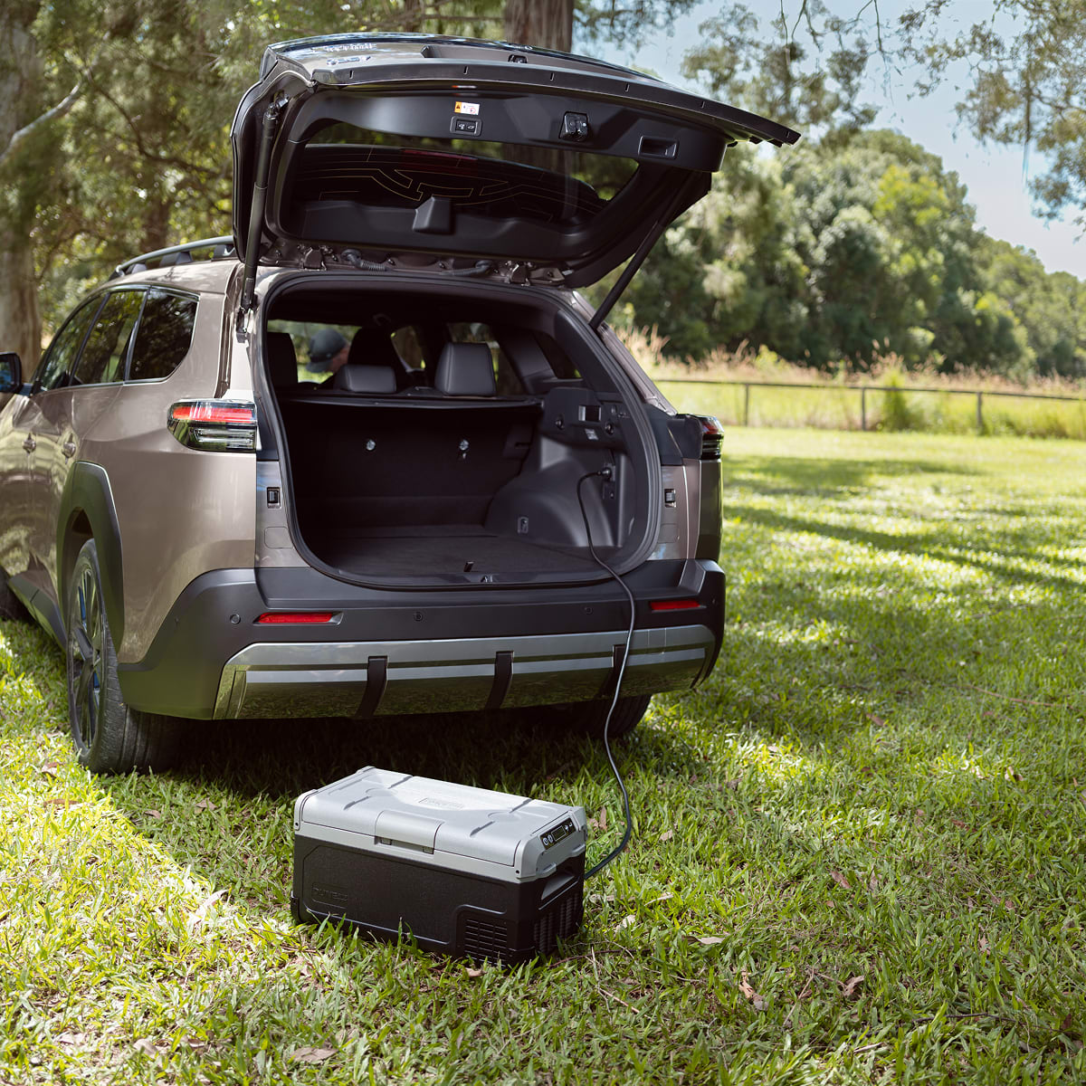 Toyota bZ4X charging at a home wall charger in Perth driveway