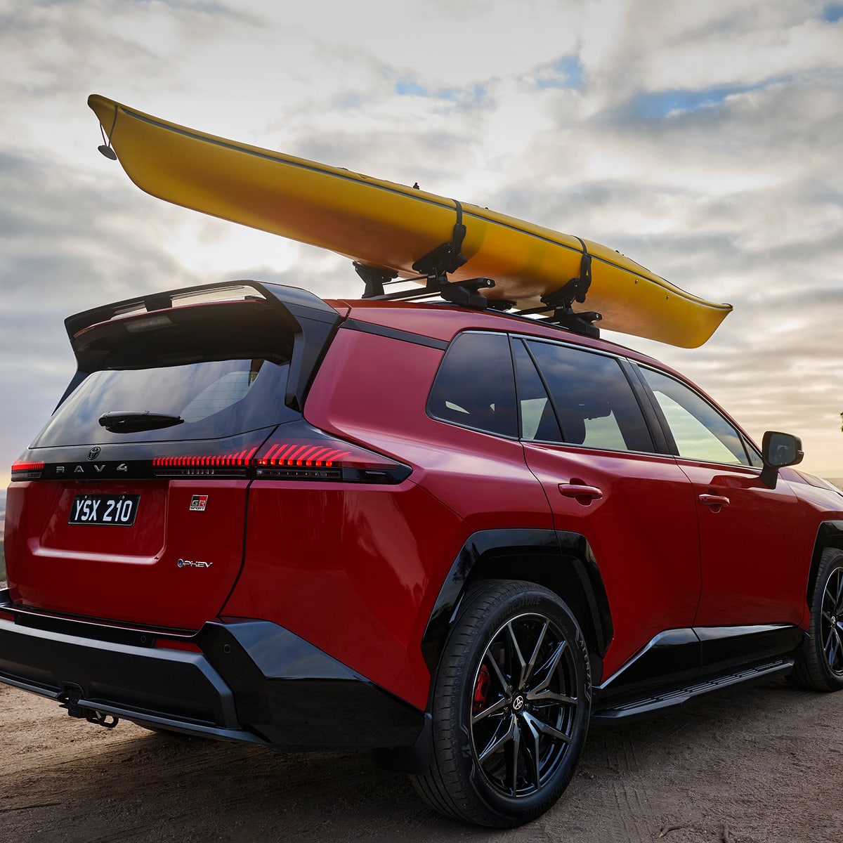 Toyota RAV4 GR Sport PHEV AWD exterior front three-quarter view'
