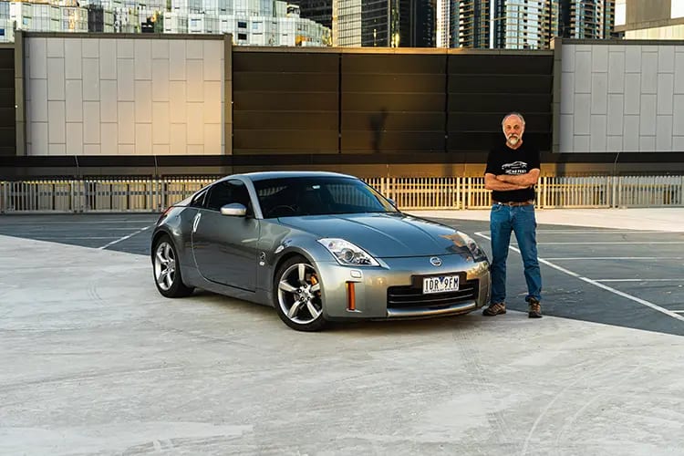 Rod Thomson standing next to his 2006 Nissan 350Z Track