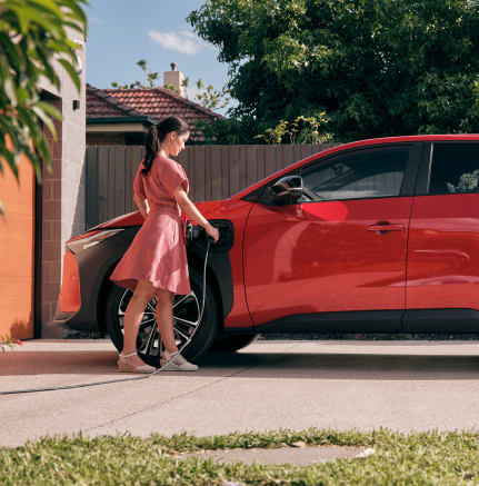 bZ4X EV charging at home, showcasing reduced fuel costs and ownership savings