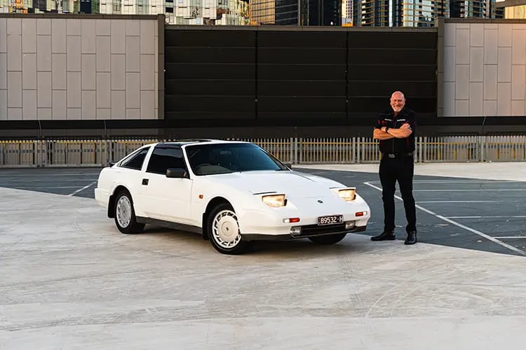 Mark Todd standing next to his 1989 Nissan 300ZX (Z31) California