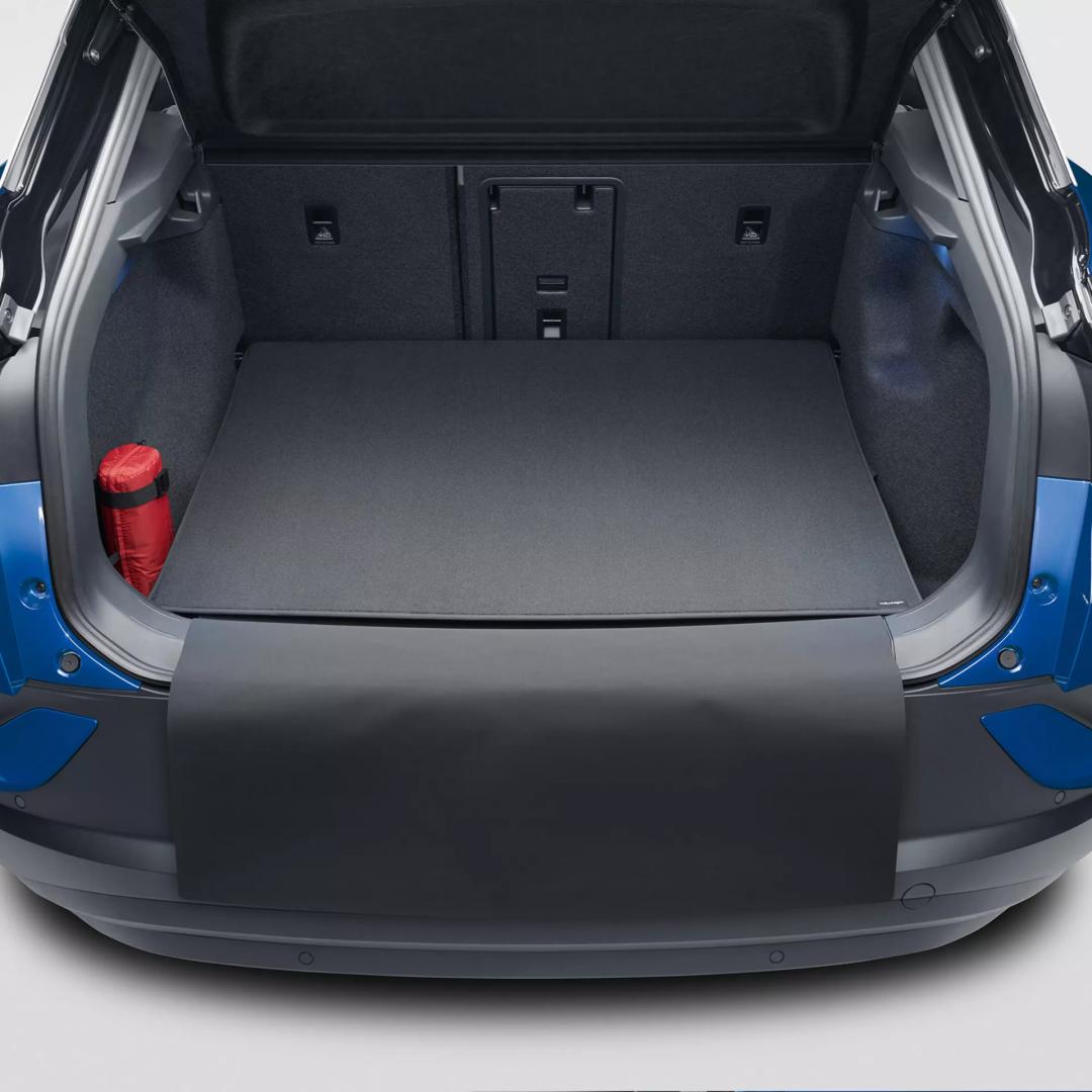 Reversible luggage compartment mat