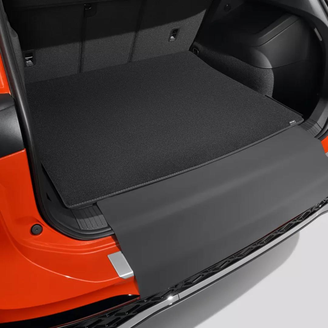 Reversible luggage compartment mat