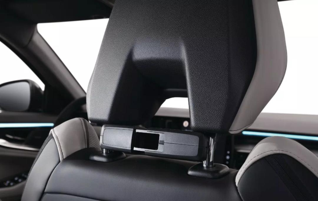 Multifunction holder on headrest