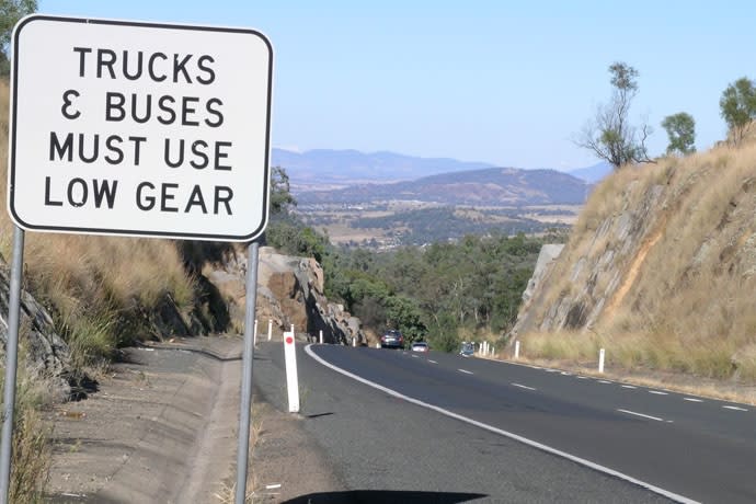 ‘Trucks and Buses Must Use Low Gear’ Stay in control on a steep descent featured image