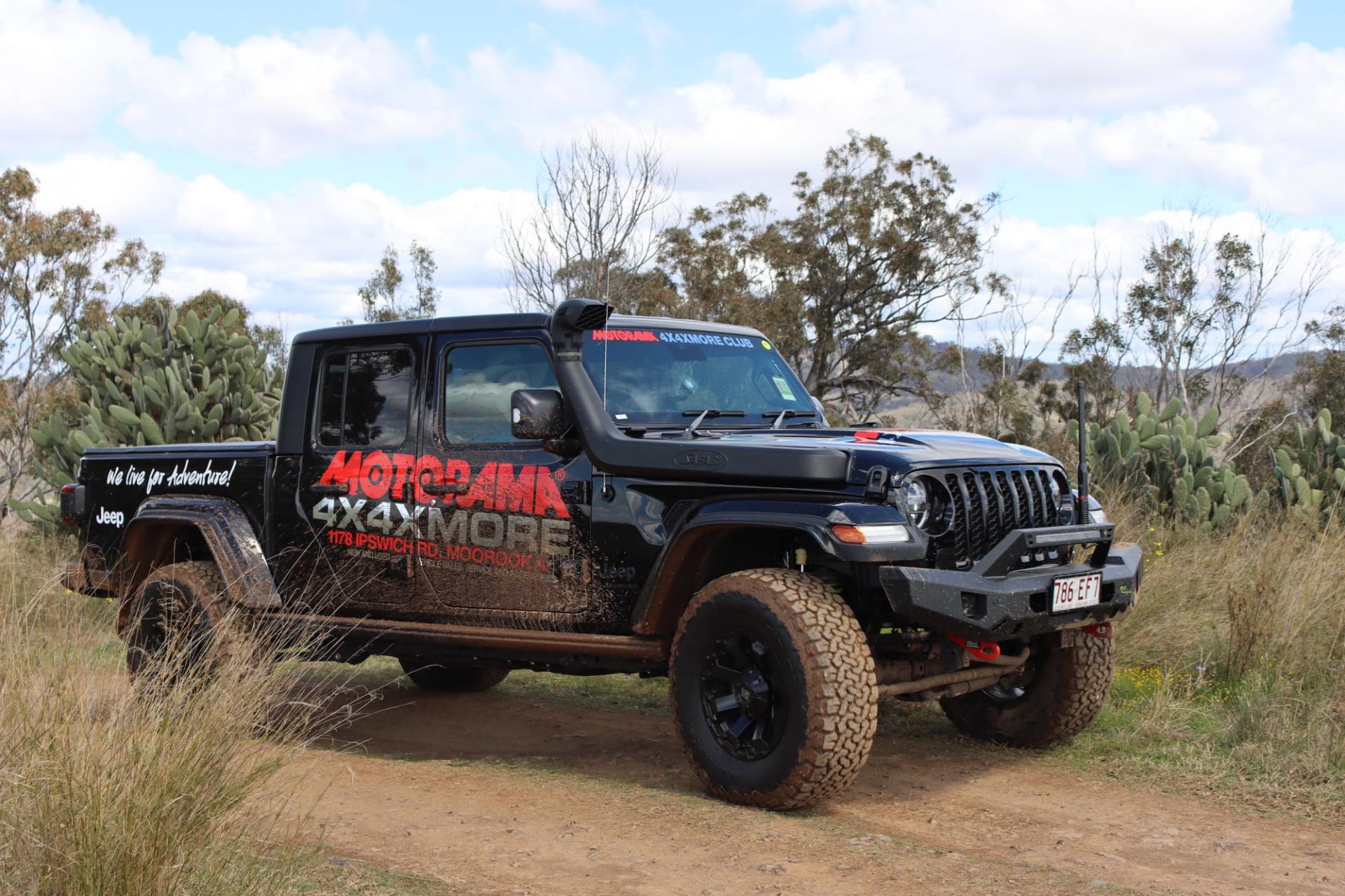A Motorama 4x4xMORE-branded Jeep on a bush track.