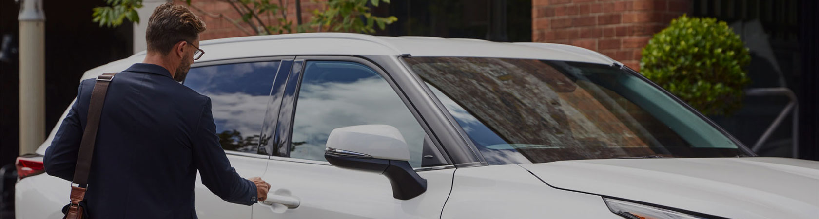 Man entering Toyota car