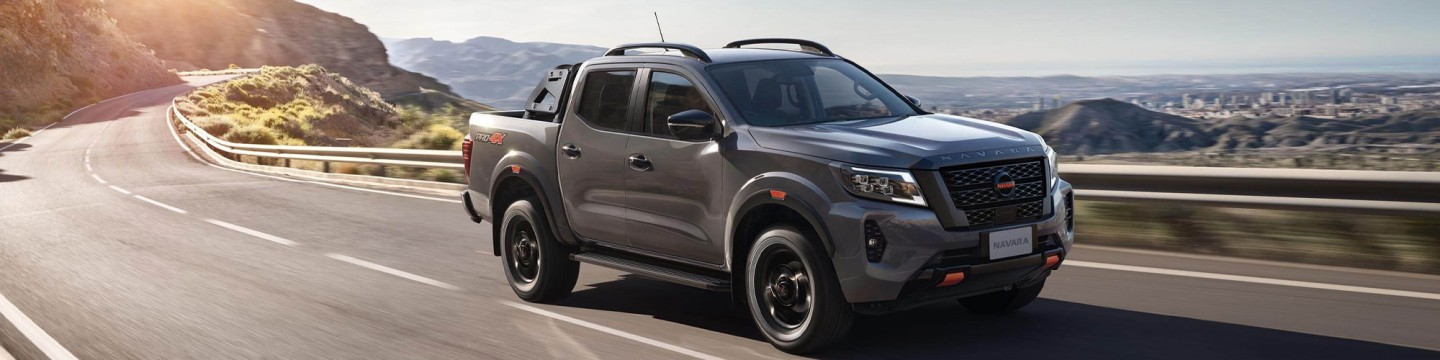 Nissan Navarra driving down highway