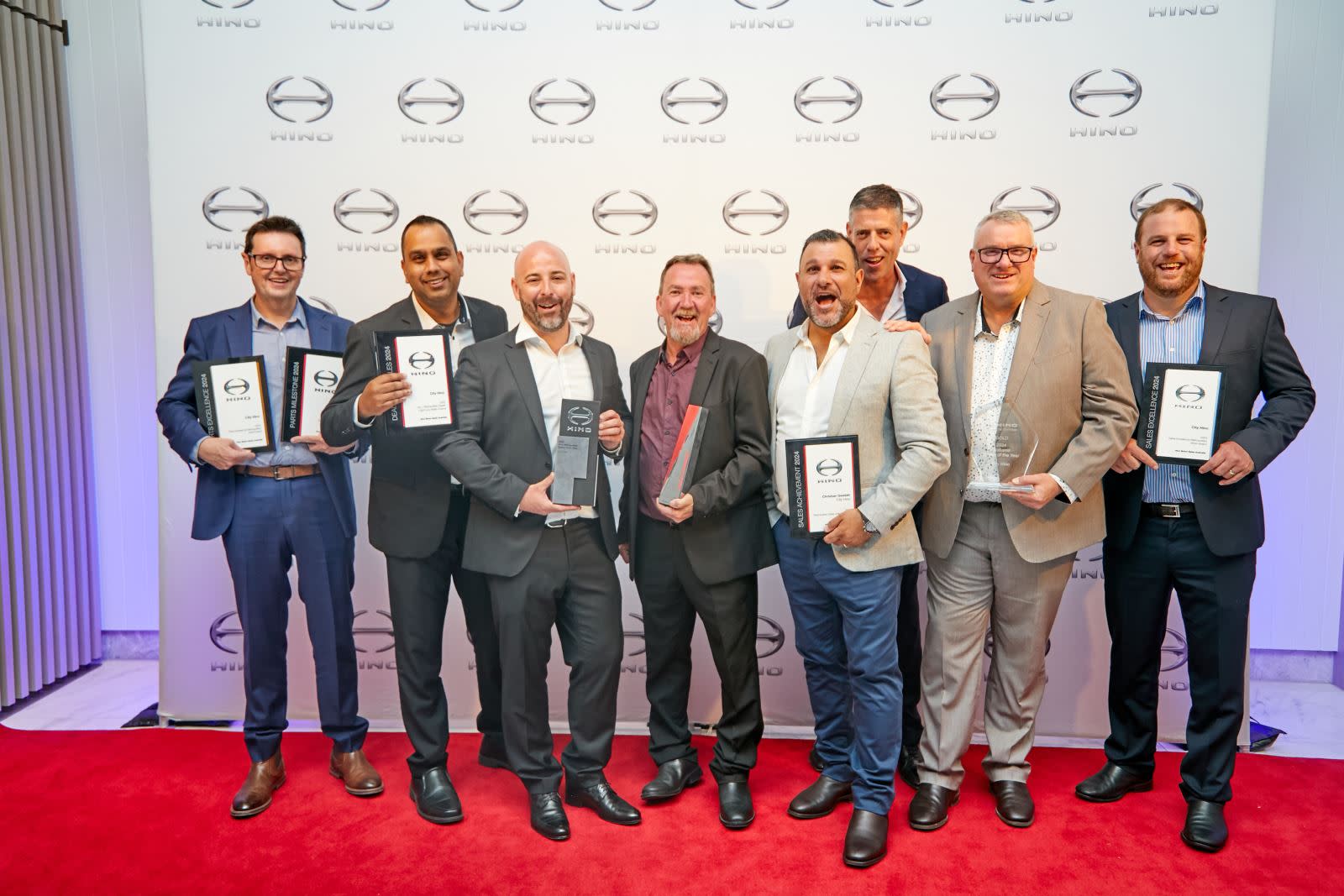 City Hino team celebrates its awards at the 2024 Hino Dealer of the Year Awards.