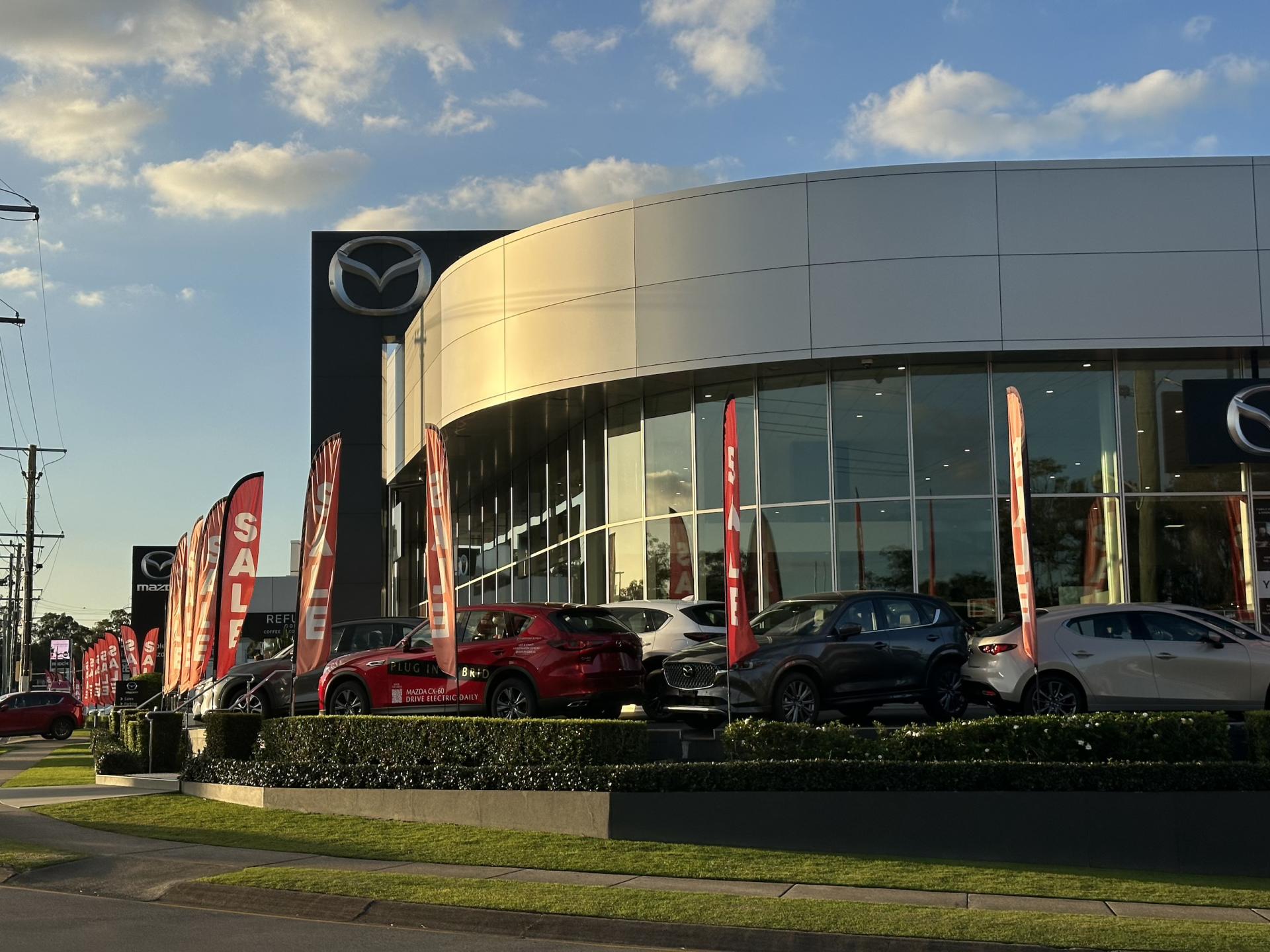 Save Big on End of Financial Year Car Sales with Aspley Mazda banner