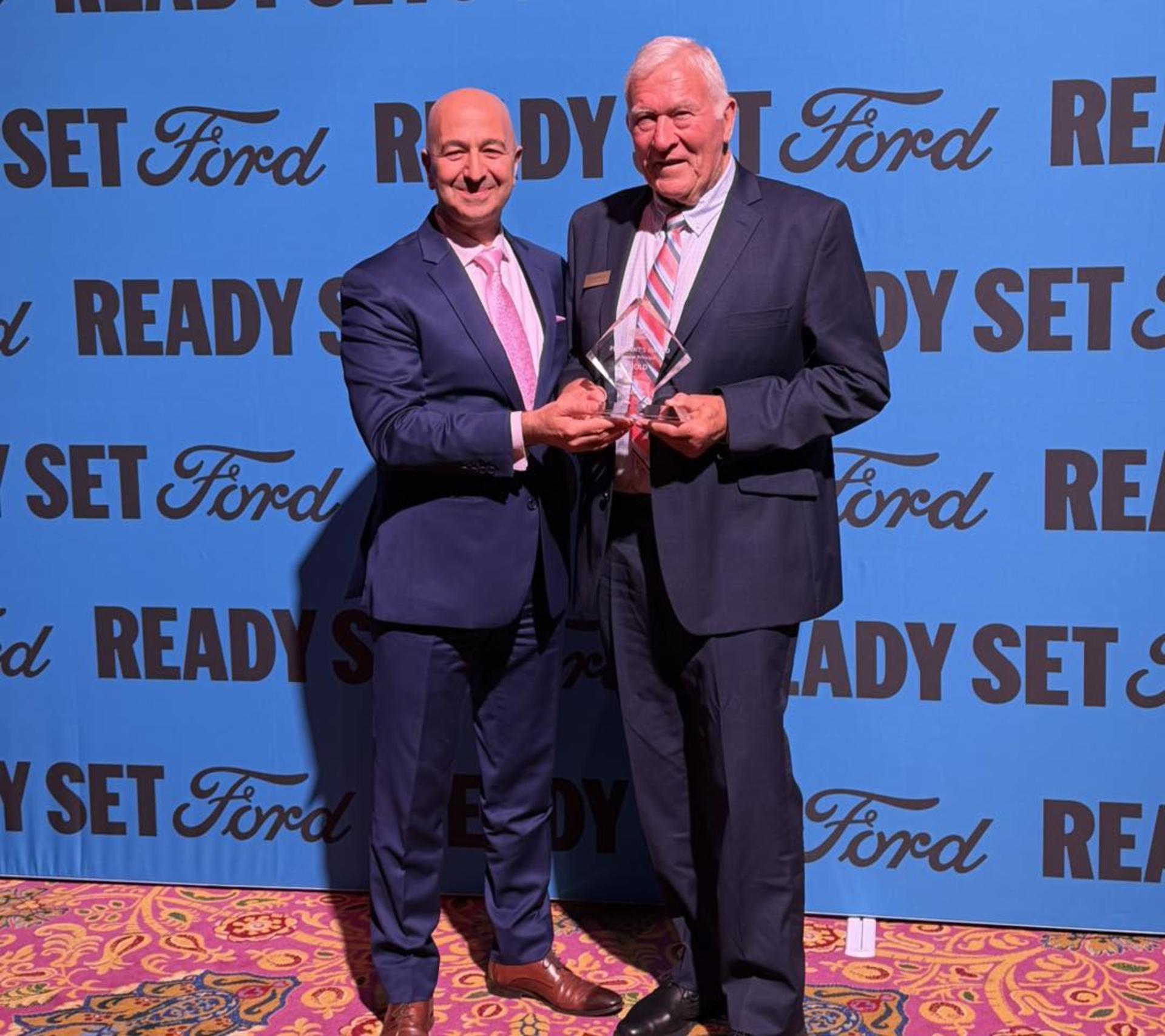 Special moment: Wayne proudly receiving the award from the President of Ford Australia — a true honour for our dealership and team&nbsp;