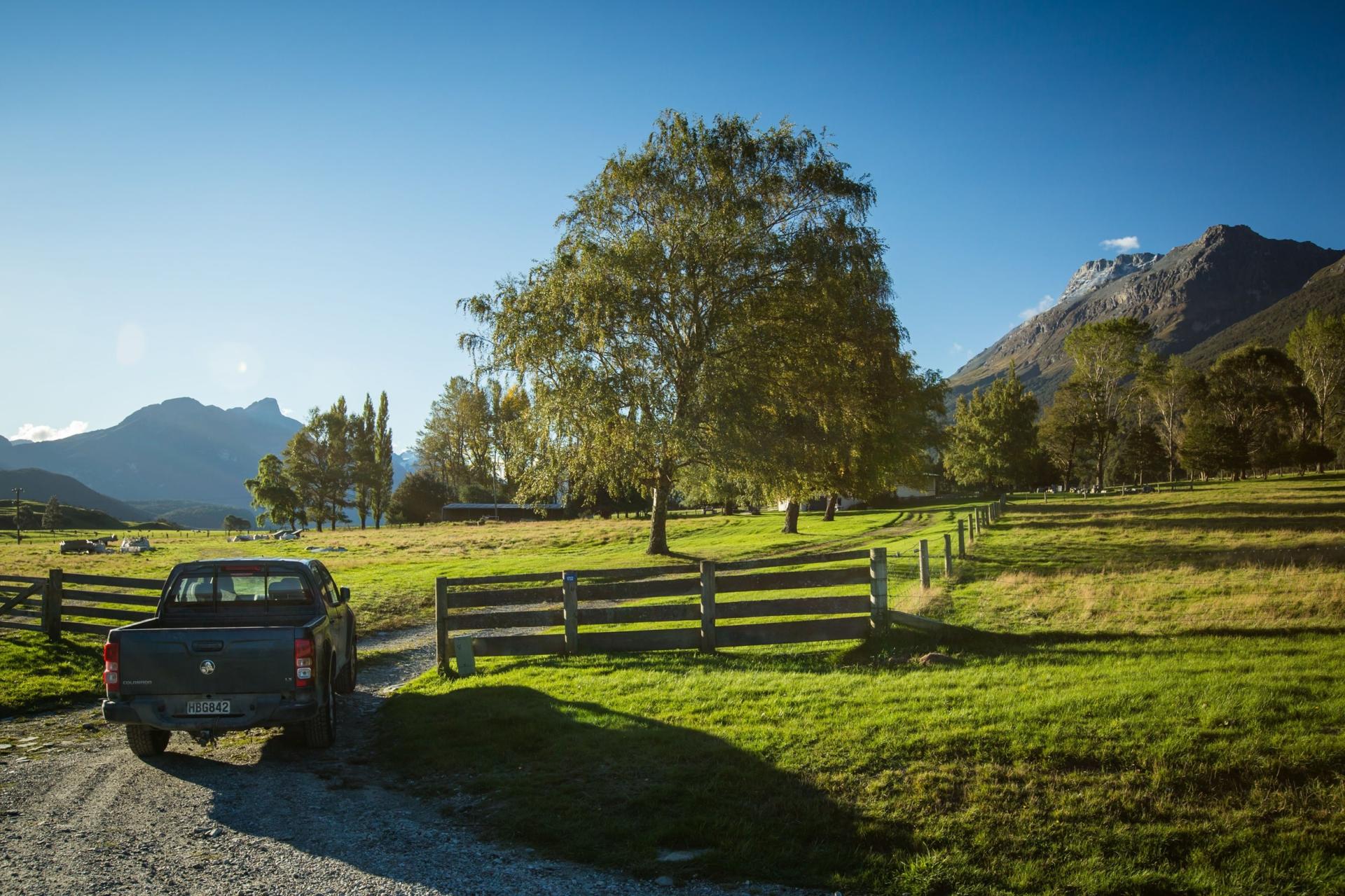 &nbsp; 4WD ute parked on a gravel track in scenic countryside surrounded by trees and mountains, ideal for weekend getaways and light off-road adventures&nbsp;&nbsp;
