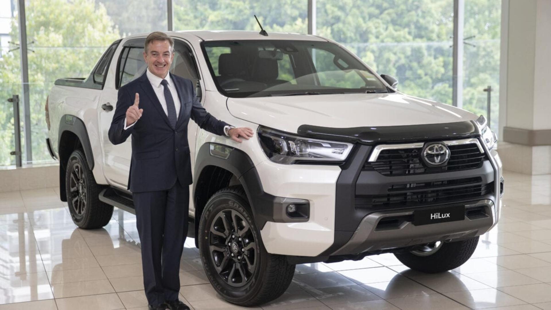 Toyota Australia President &amp; CEO Matthew Callachor with Australia’s top selling vehicle for 2020 Toyota HiLux.