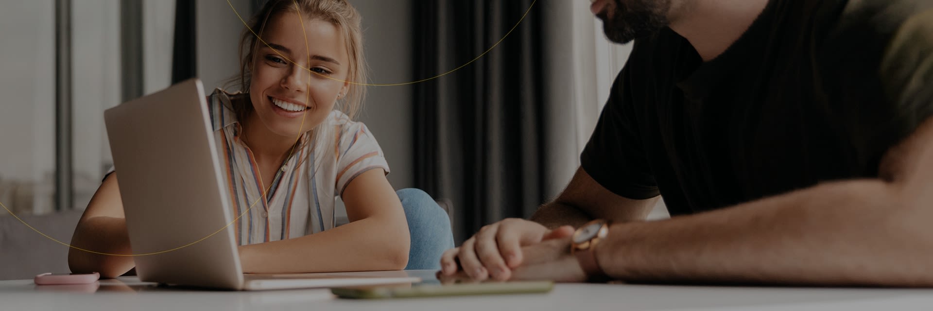 Couple looking at a laptop