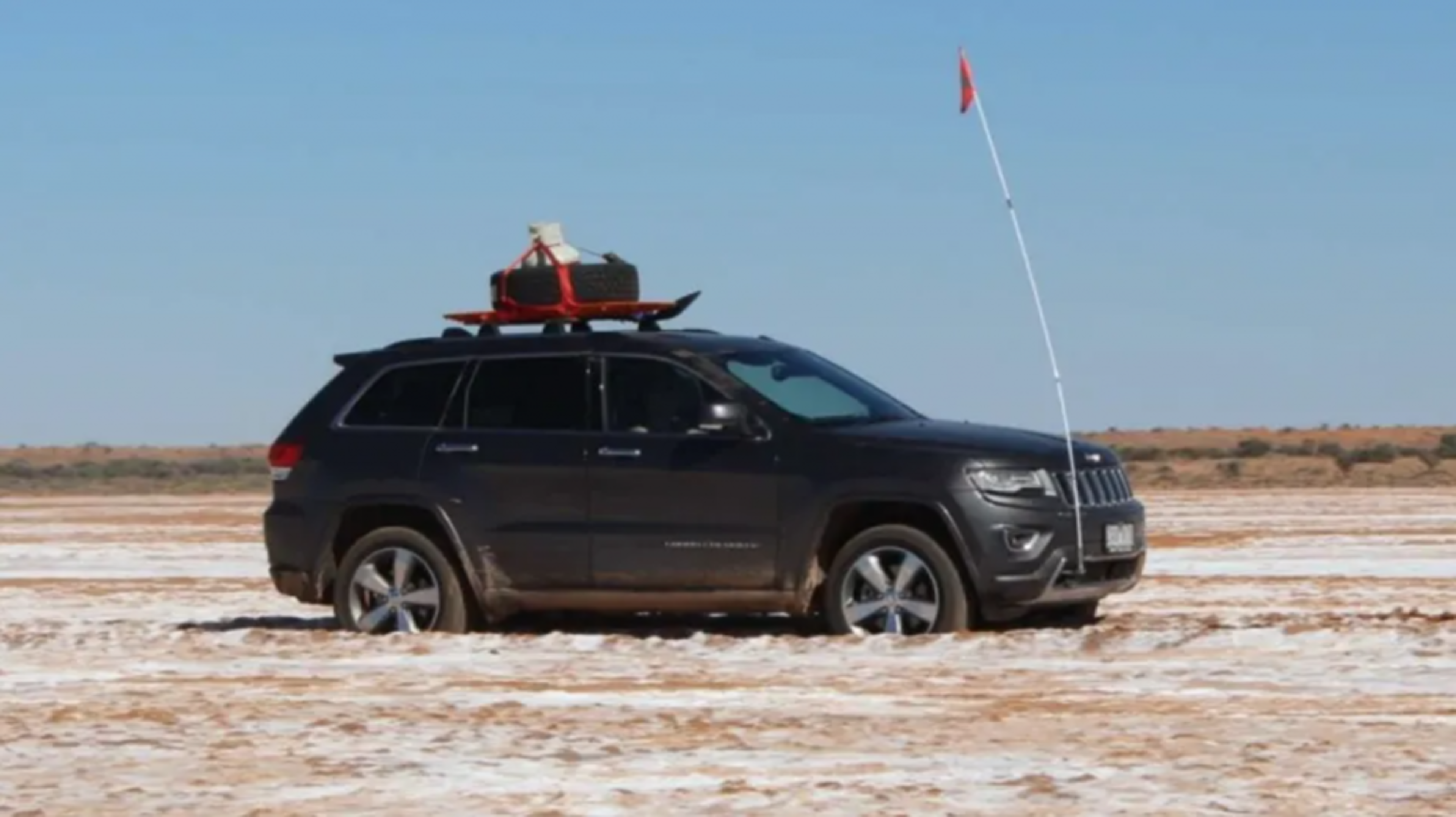 2014 Jeep Grand Cherokee Overland versus the Australian Outback banner