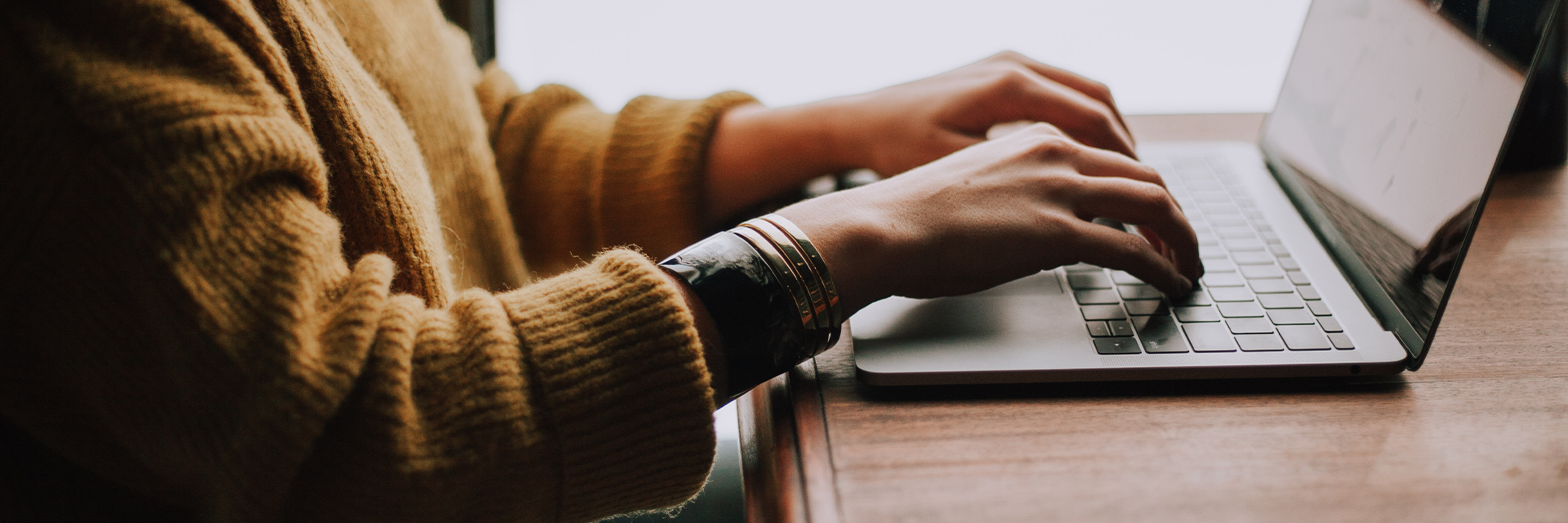 Buying a car on a laptop from the comfort of your home