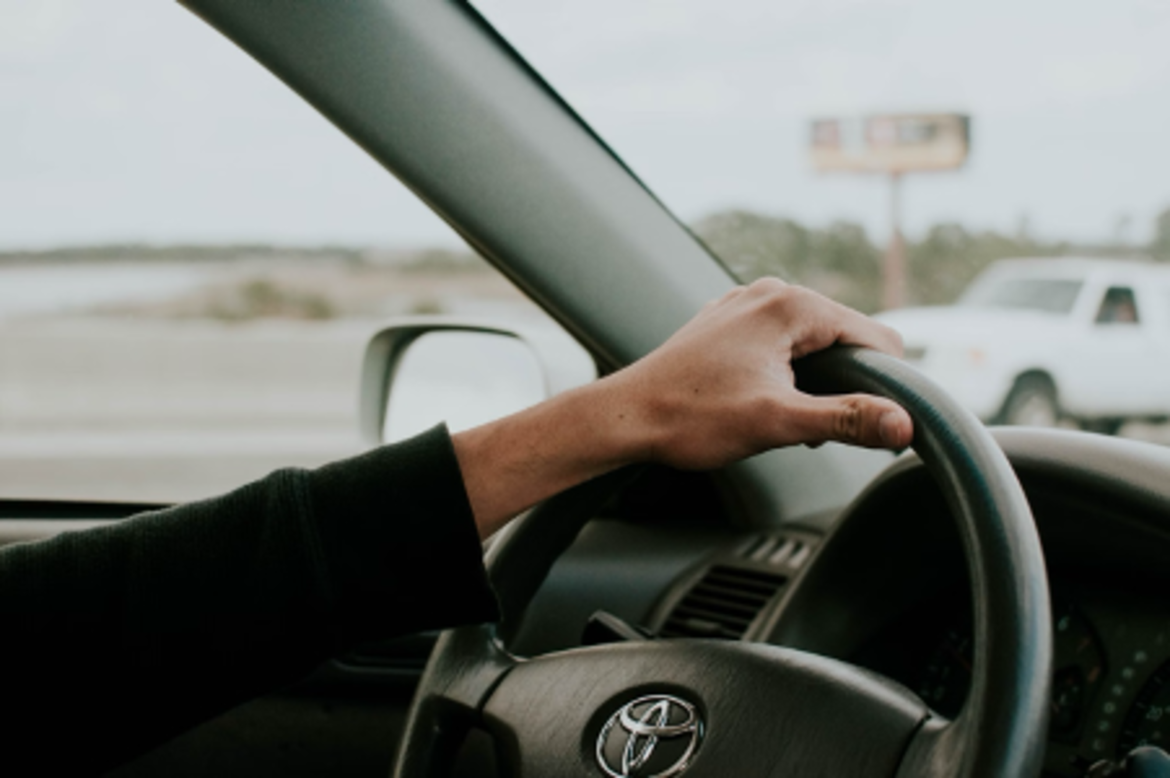 Person driving used car