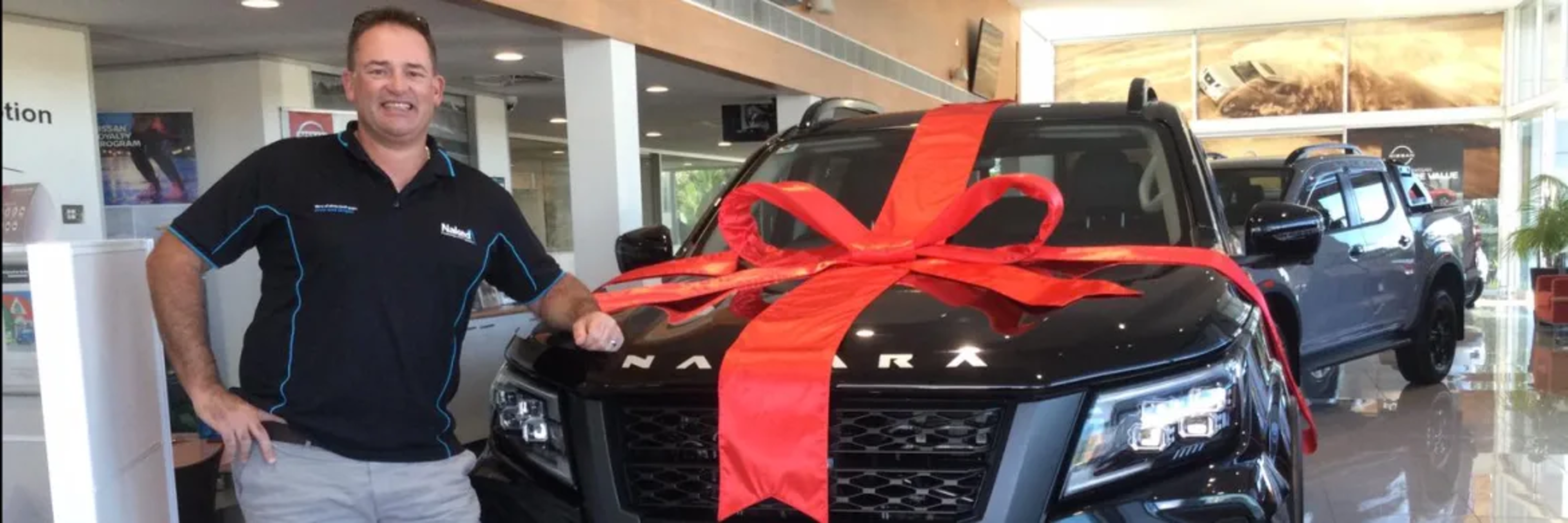 Nissan navarra wrapped in red bow