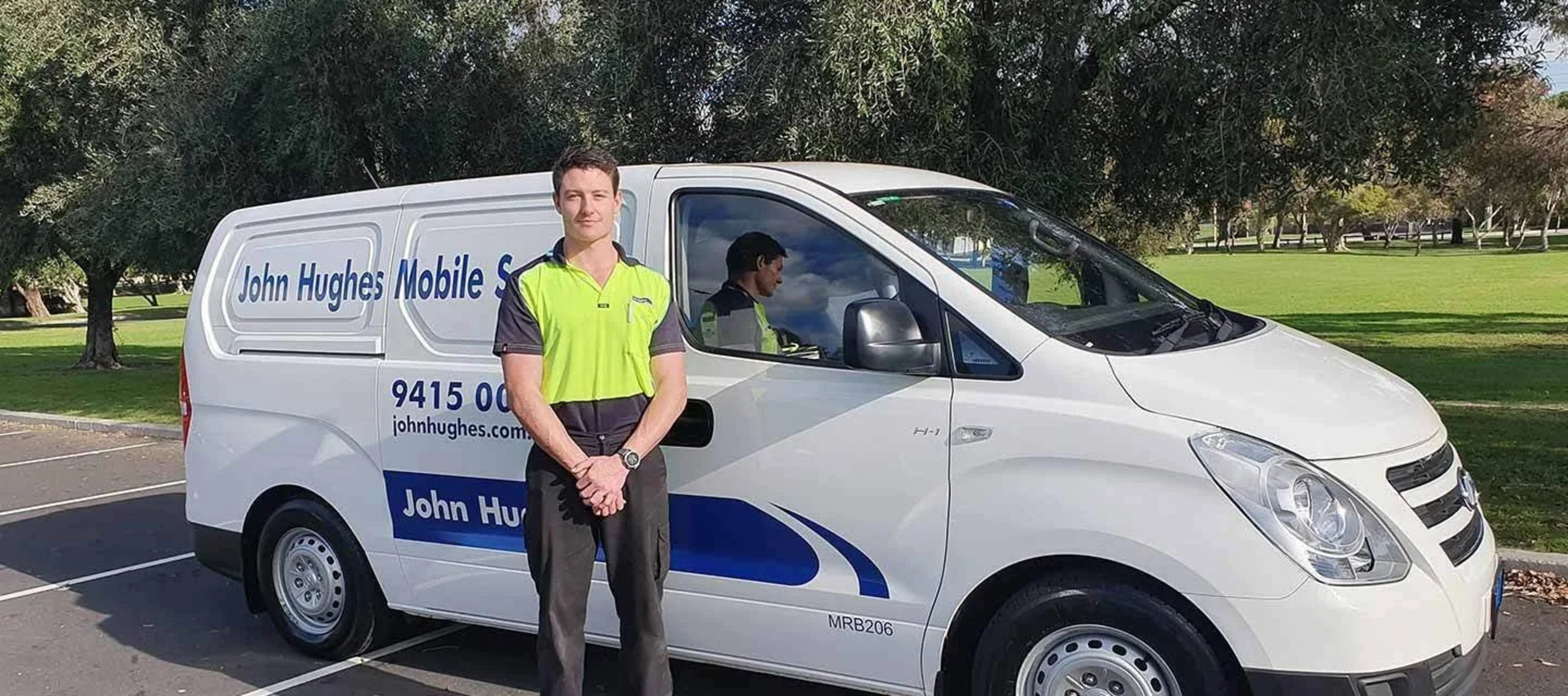 Mobile mechanic in front of van