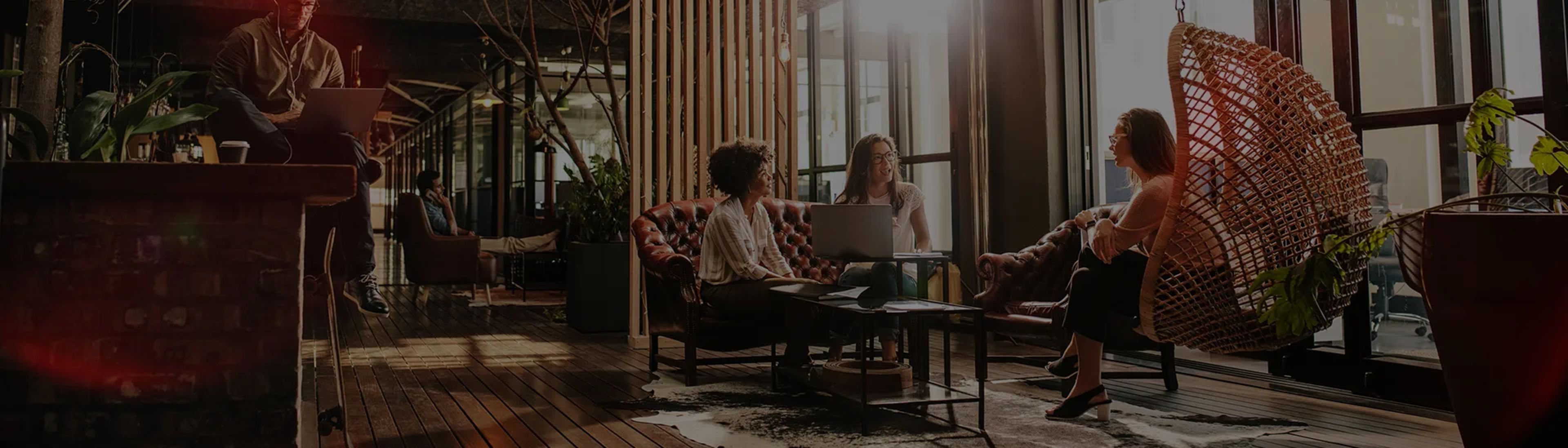 3 women having a meeting