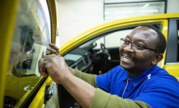 Man applying window tint