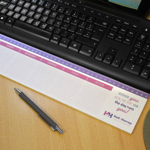 UK Printed Keyboard Notepads on a Desk from Total Merchandise