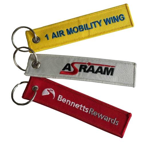 A lifestyle image of the Embroidered Keyrings with a range of different company logos