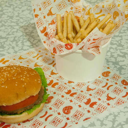 Printed greaseproof paper with food