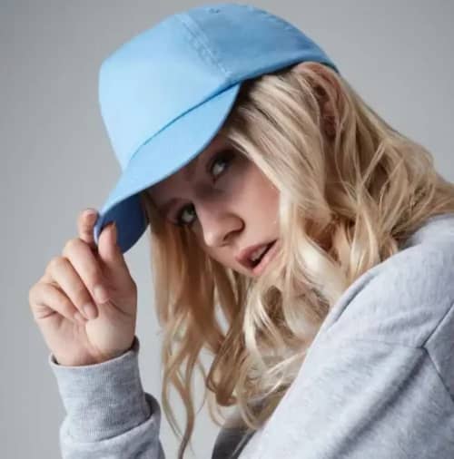 Promotional Beechfield Original Cotton 5 Panel Cap in Sky Blue being shown on the model