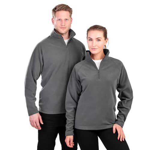 A man and woman wearing Result Core Half Zip Fleece Jackets in charcoal from Total Merchandise