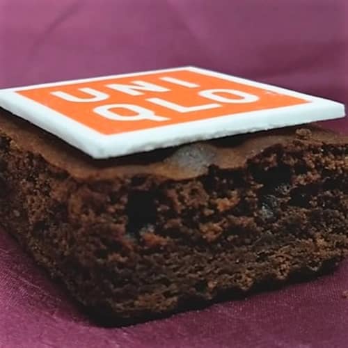 Custom Printed Brownies Topped with White Icing That is Printed with a Logo by Total Merchandise