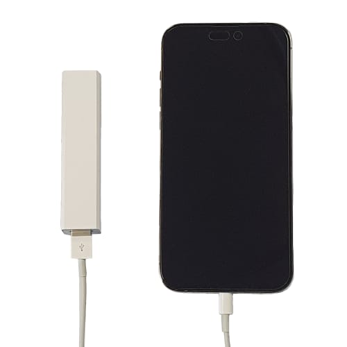 White Branded 2200mAh Cuboid Power Banks Charging a Mobile Phone at Total Merchandise
