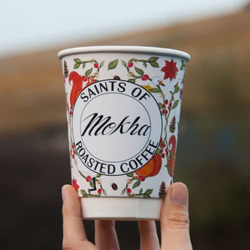 Promotional Double Wall Compostable Coffee Cups Held in Hand