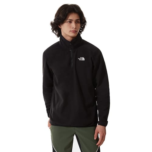 A lifestyle image of The North Face Men's 100 Glacier 1/4 Fleece in Black from Total Merchandise