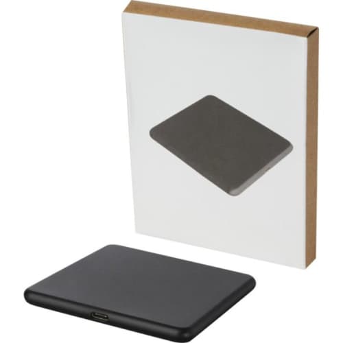 An image of the 10W Recycled Plastic Wireless Charging Pad with the box from Total Merchandise