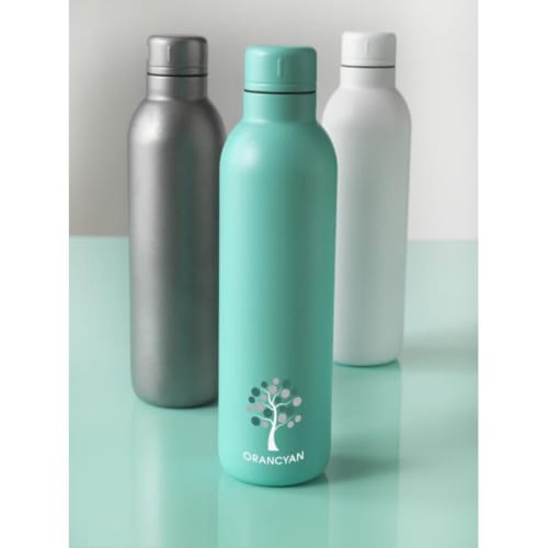 Image of the grey, white, and mint bottles together from Total Merchandise