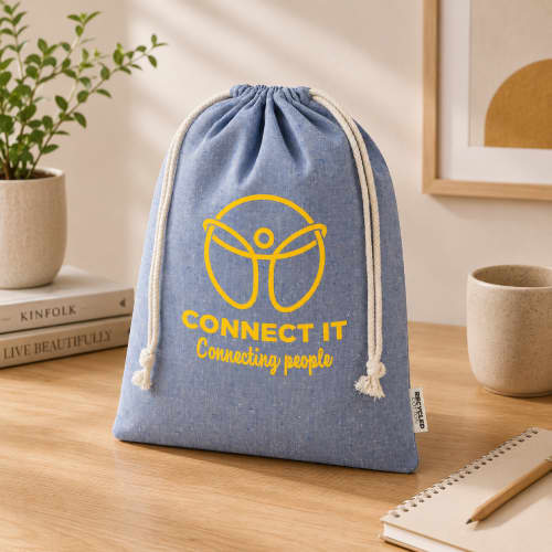 Lifestyle image of the Large GRS Recycled Cotton Gift Bag by Total Merchandise
