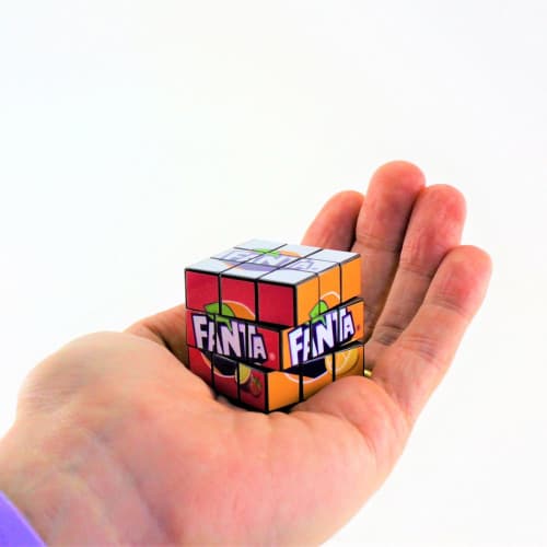 Mini Rubik's Cube in a hand from Total Merchandise