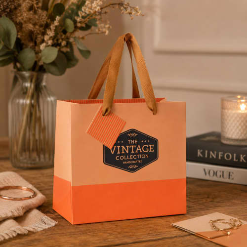 Lifestyle image of the Cavalla Mini Paper Gift Bags by Total Merchandise