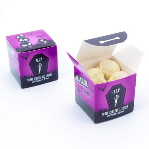 The ogo-printed Eco Cube Of White Chocolate Skulls are perfect for Halloween and its spooky season