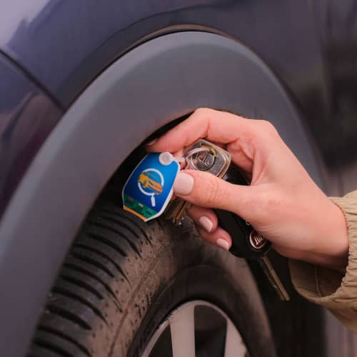 UK Printed Eco Essential Tyre Depth Gauge In Use by Total Merchandise