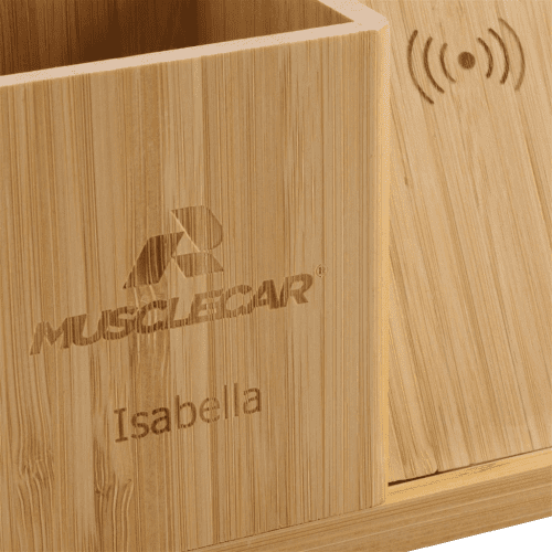 A close up image of an engraved design on the Calgary Bamboo Wireless Charger