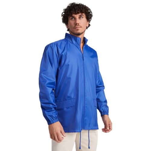 Lifestyle image of the ROLY Escocia Unisex Lightweight Rain Jacket