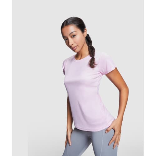 A lifestyle image of the ROLY Montecarlo Short Sleeve Women's Sports T-Shirt