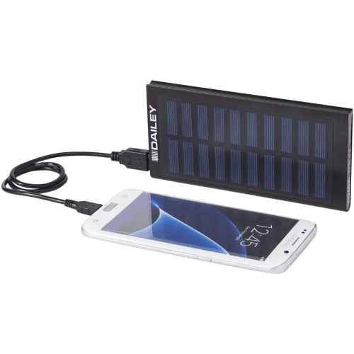 A lifestyle image to show the Stellar 8000mAh Solar Powerbank charging a phone