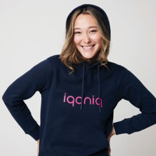 Lifestyle image of the Iqoniq Jasper Sustainable Hoodie from Total Merchandise