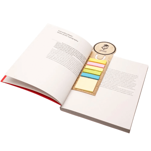 Lifestyle image of the Bamboo Sticky Note Bookmark with a design from Total Merchandise