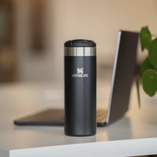 Lifestyle image of the Stanley 470ml AeroLight Transit Tumbler from Total Merchandise